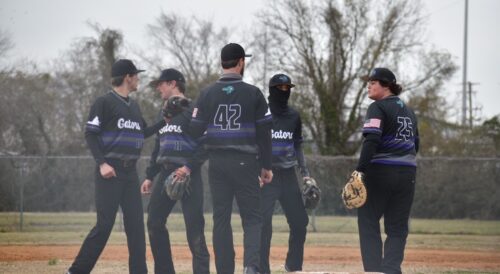Baseball coach Todd Parker and some of the baseball team