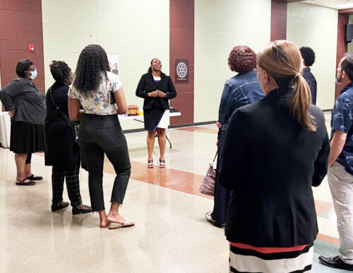 Keisha Samuels (center) is leading the College's efforts to reconnect with the residents and employers in downtown Newport News