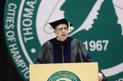Dr. John Dever speaking at a commencement