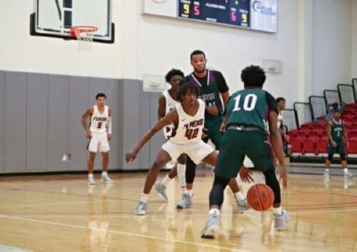 College players hung with those of 10th-ranked Sandhills Community College for much of the first half in their 90-71 loss. (Photo courtesy of Sandhills Community College)
