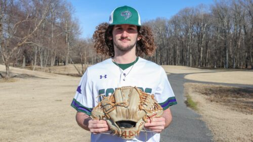 Zack Easton shows off his specialty glove for pitching.