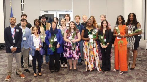 PTK President Cameron Johnson (left) welcomed nearly 20 new members into the honor society April 16.