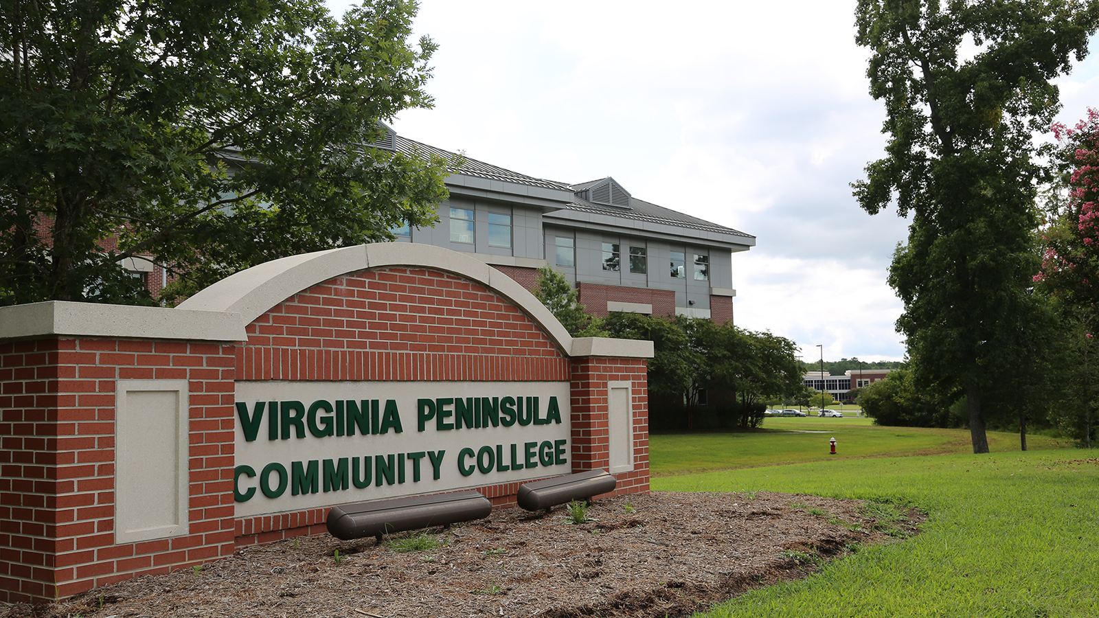 Feature image for page. Picture of Historic Triangle Campus building with sign.