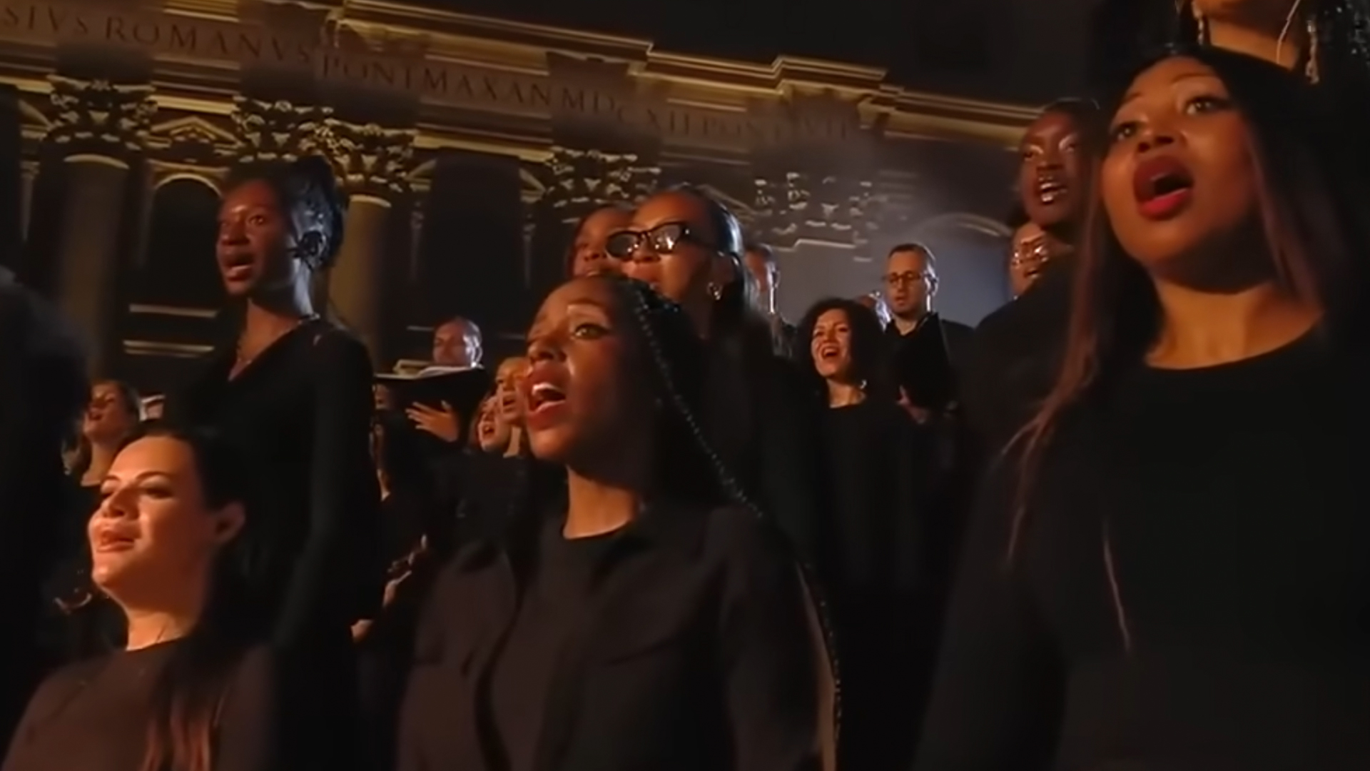 Nakia Madry-Smith (center) and the Voices of Fire ensemble perform “Amazing Grace” during the “Grace for the World” concert. Image courtesy of Disney via YouTube