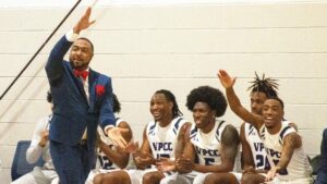 Coach Chris Moore, shown earlier in the season, took the Gators to the Northeast, where they went 2-1.