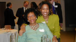 Dr. Mary T. Christian and granddaughter Cheryl Smith were all smiles at a reception at the College in 2003 honoring the theater's namesake.