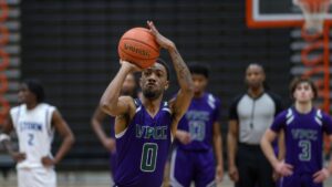 Isaiah Thomas keeps his eyes on the rim as he takes a free throw against Tidewater Community College.