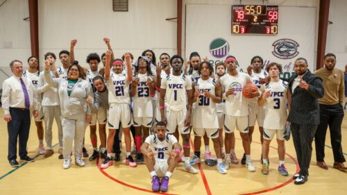 The Gators celebrate after their 78-58 win over Tidewater Community College on Sunday, Feb. 15.