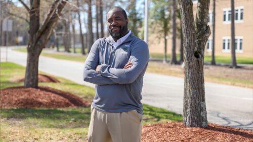 Eugene Baker is a head coach again.