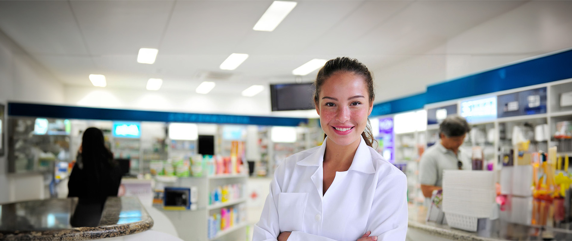 A female pharmacist in a pharmacy store