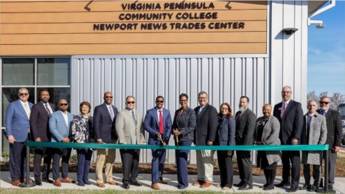 VPCC President Dr. Towuanna Porter Brannon and Newport News Mayor Phillip Jones lead the ribbon-cutting for the Virginia Peninsula Community College Newport News Trades Center.
