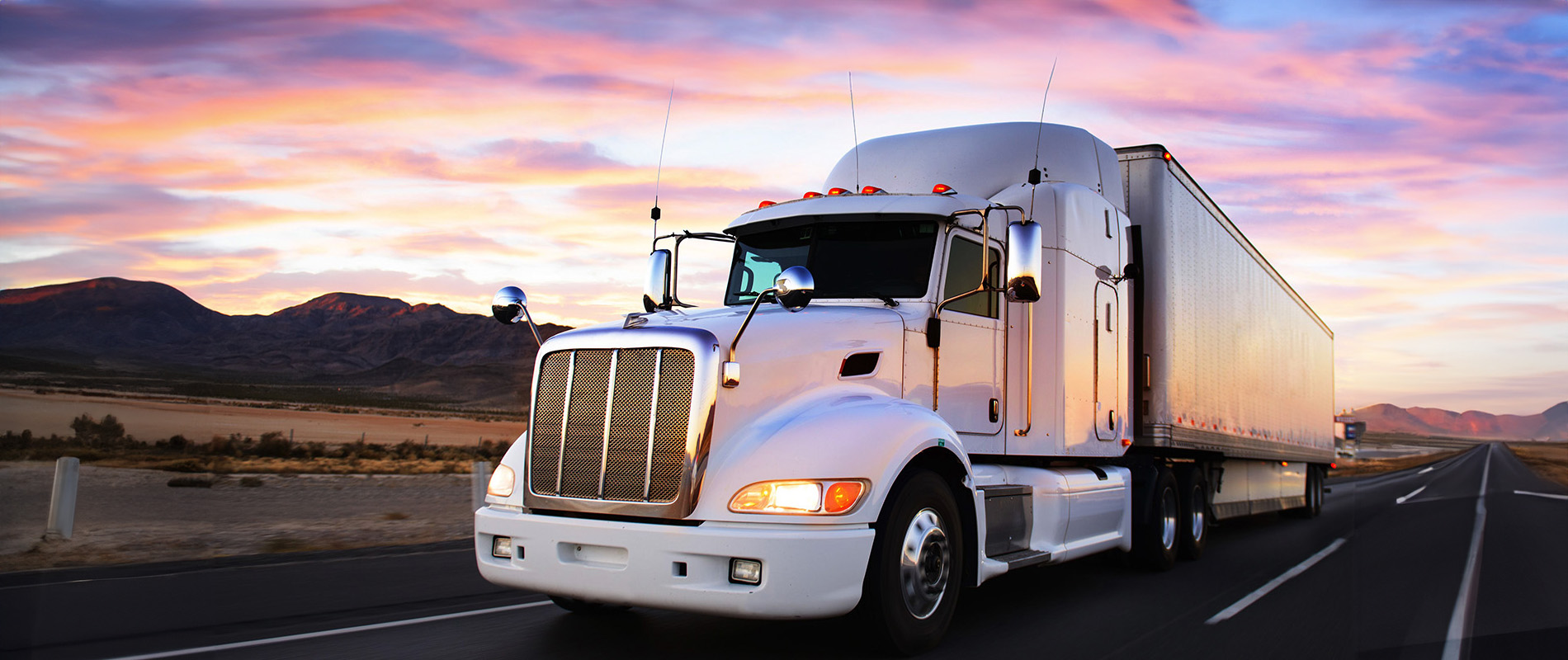 A semi truck in a highway