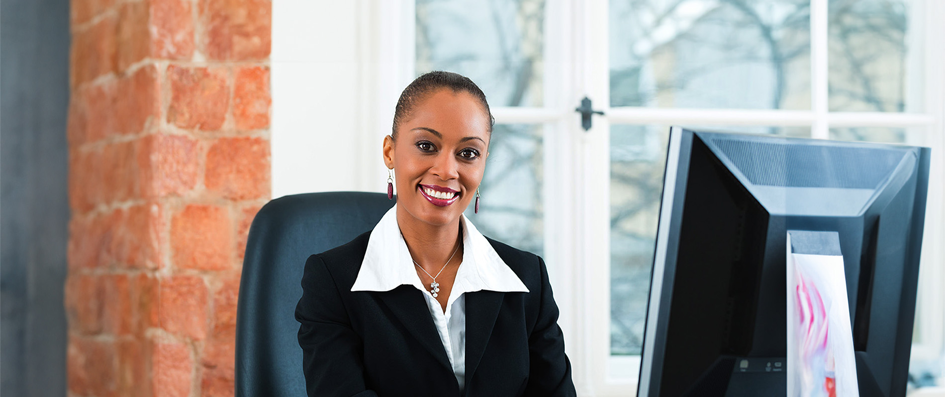 Female attorney sitting in the office