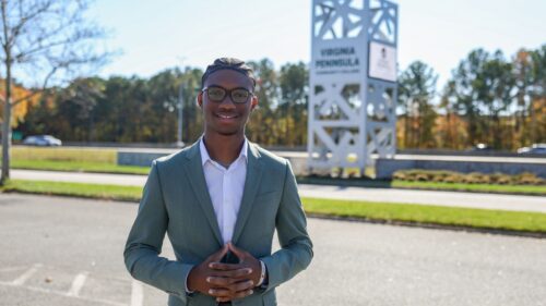 Pictured near VPCC's tower sign at the Hampton Campus Cameran Drew is the keynote speaker for the college's 2026 Commencement.