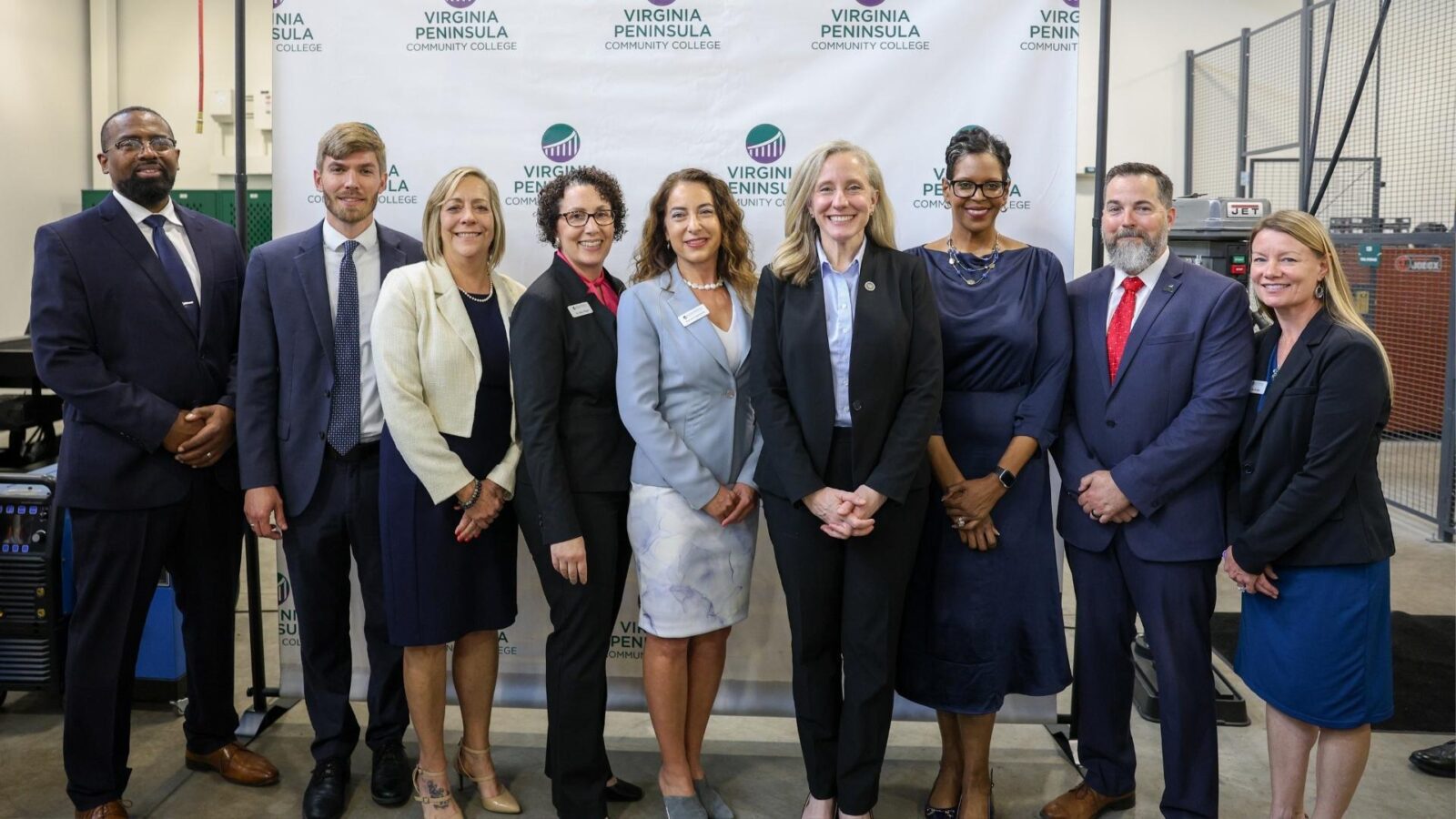 Gov. Abigail Spanberger (fourth from right) was joined by a host of VPCC officials at Wednesday’s bill signing. The VPCC representatives were (from left) Bobby Perkins (Director of Manufacturing, Skilled Trades and Transportation), Steven Felker (VP for Institutional Effectiveness and Transformation), Barbara Mason (Executive Assistant and Project Manager), Dr. Kerry Ragno (VP for Academic Affairs), Daniela Cigularov (VP for Enrollment Management and Student Success), Dr. Porter Brannon (President), Todd Estes (VP for Workforce Development and Innovation), and Ada Badgley (Chief of Staff and Director of Strategic Initiatives).