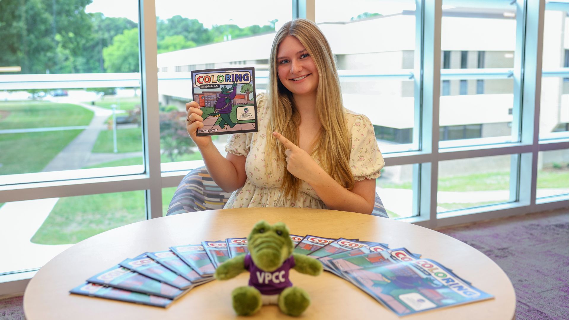 Student Cami Dunlap shows off her VPCC coloring book.