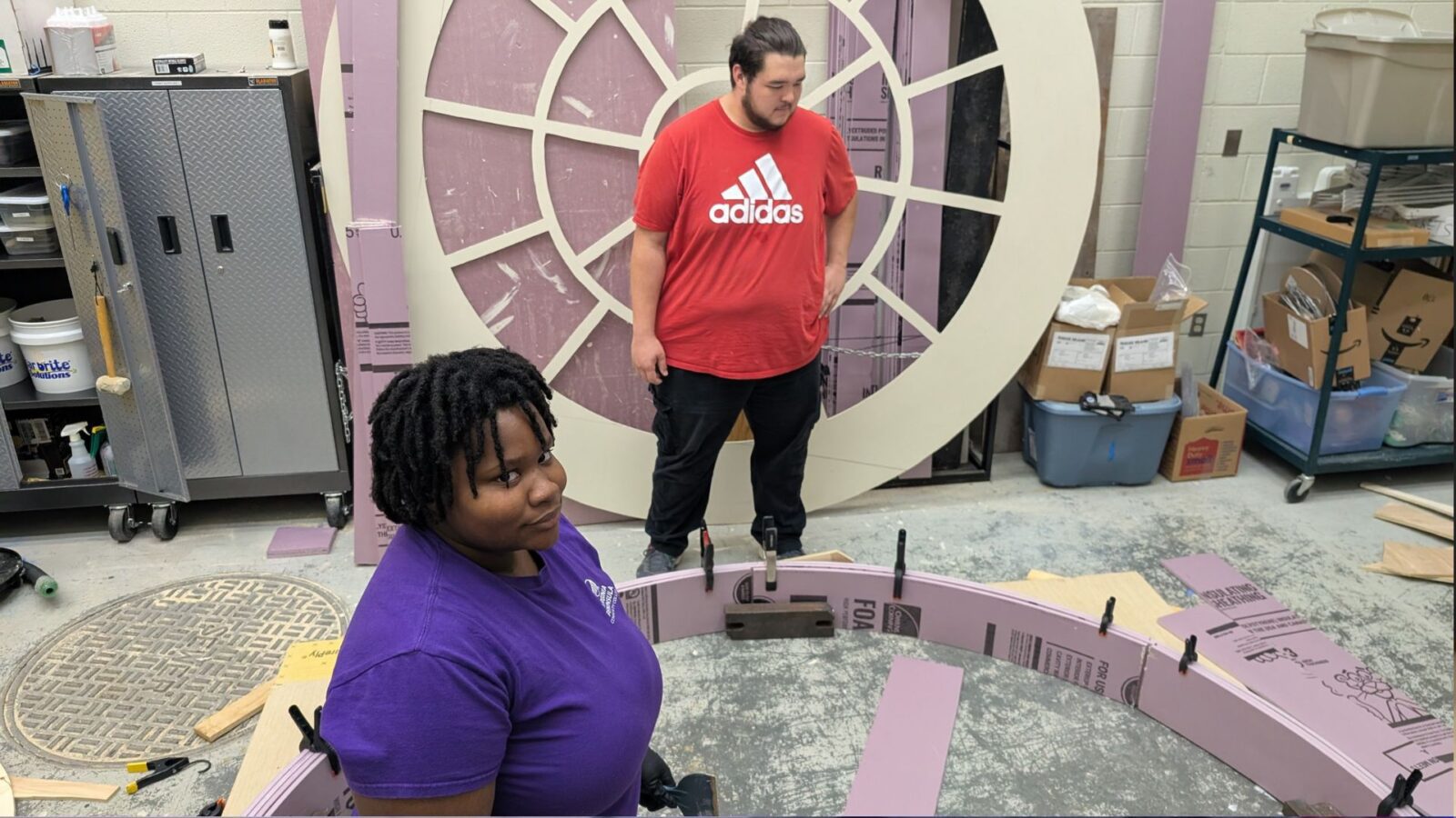 Kynnidi Piert (front) and Max Ikehara were among the VPCC students who worked on scenery for the VA250 July 4 event.