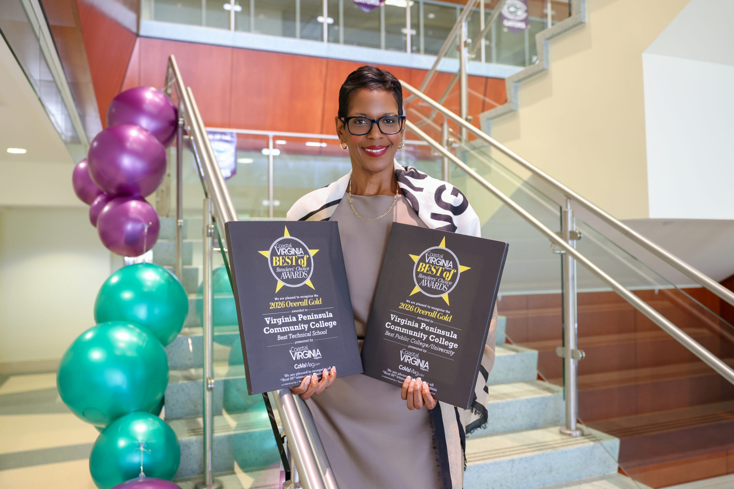 President Brannon with two Readers' Choice Awards plaques